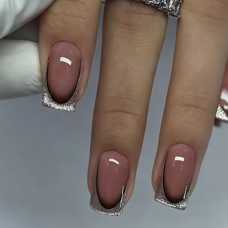 Kunstnagelset mit luxuriösen Glitzerfranzösisch-Spitzen Brehn