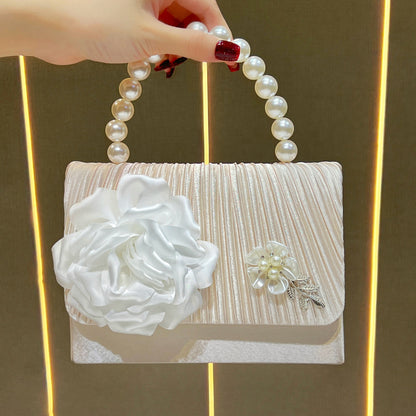 Elegante florale Abendtasche