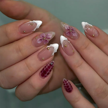 Kunstnagelset mit eleganten Blüten- und Glitzerakzenten Brehn