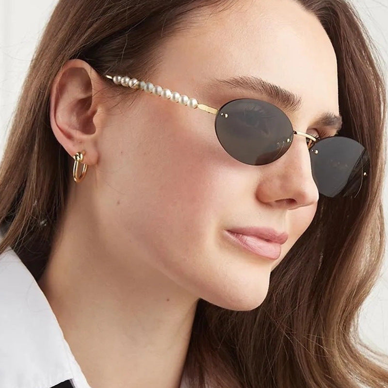 Damen stilvolle ovale Sonnenbrille mit eleganten Verzierungen Brehn
