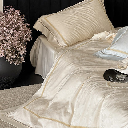 Luxuriöse Baumwollsatin-Bettwäschegarnitur mit Jacquard-Blütenmuster und bestickter Bordüre