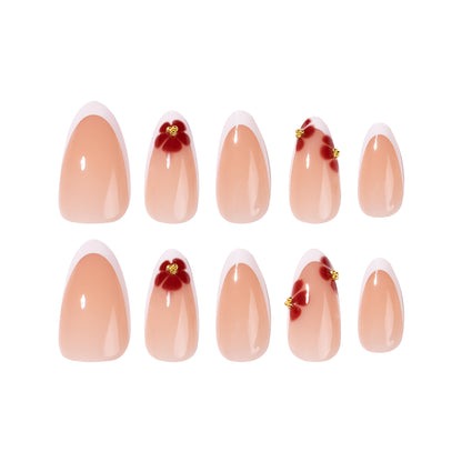 Kunstvolle Stiletto-Nägel mit luxuriösem floralem Design Brehn