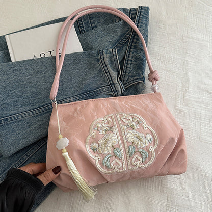 Elegante gestickte Abendhandtasche