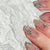 Kunstnagelset mit extravaganten Glitzer- und Kristallverzierungen Brehn