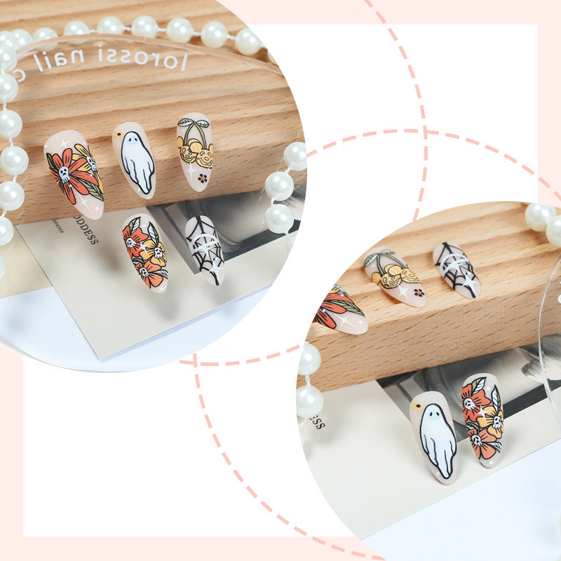 Künstlerisches Press-On-Nagelset mit saisonalen Blumen- und Geisterdesigns Brehn