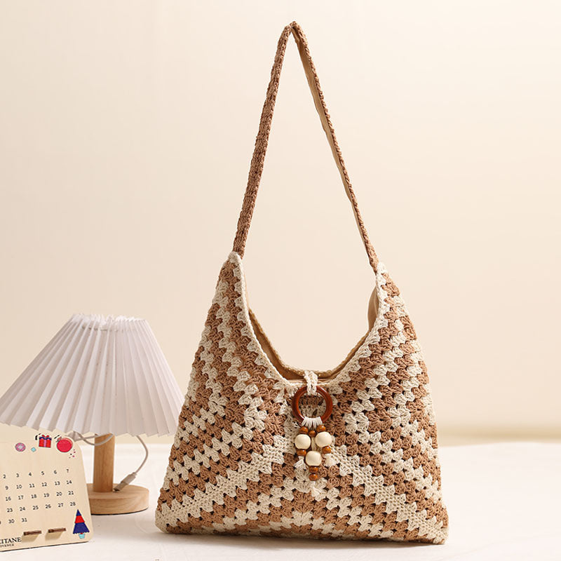 Damen Handtasche mit kunstvollem Flechtmuster Brehn