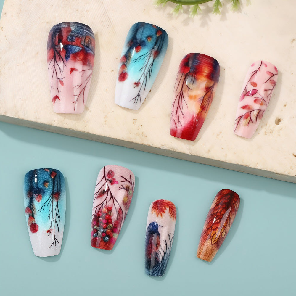Kreative Kunstnägel mit floralen und künstlerischen Mustern Brehn