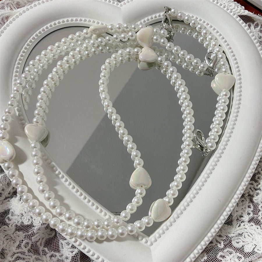 Eleganter Perlenbesetzter Brillenhalter Brehn