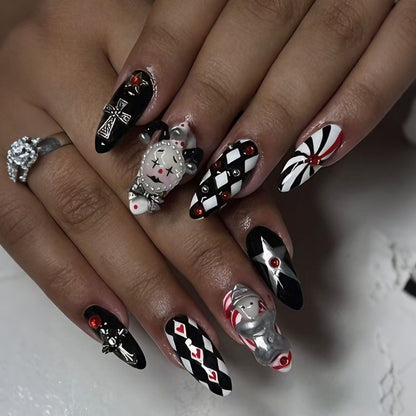 Kunstnagelset mit kreativen Halloween-Motiven und eleganten Akzenten Brehn
