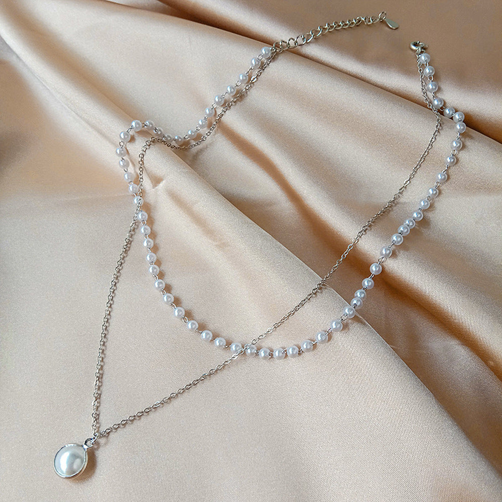 Elegante geschichtete Perlenkette Brehn