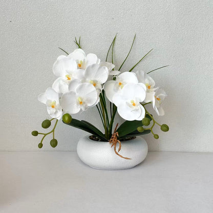 Lebensechte Orchideenblumenstrauß-Anordnung