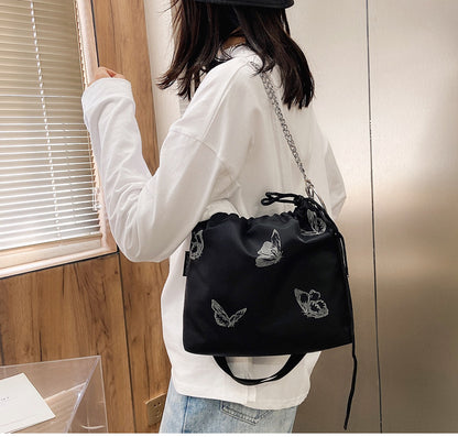 Elegante Drawstring Schmetterlingsdruck Handtasche