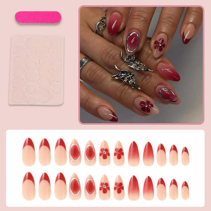 Kunstnagelset mit eleganten Blüten- und Ombre-Akzenten Brehn