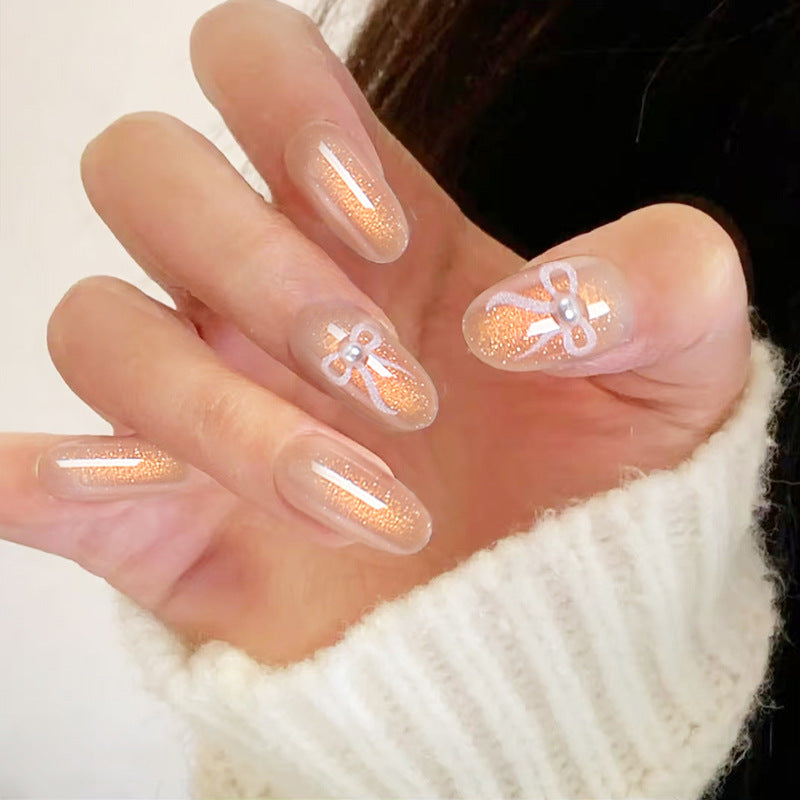 Glamouröse Kunstnagelspitzen mit Glitzerakzenten Brehn