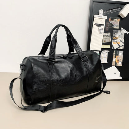 Elegante Woven Leather Duffle Bag