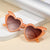 Damen Herzförmige Sonnenbrille im innovativen Design Brehn
