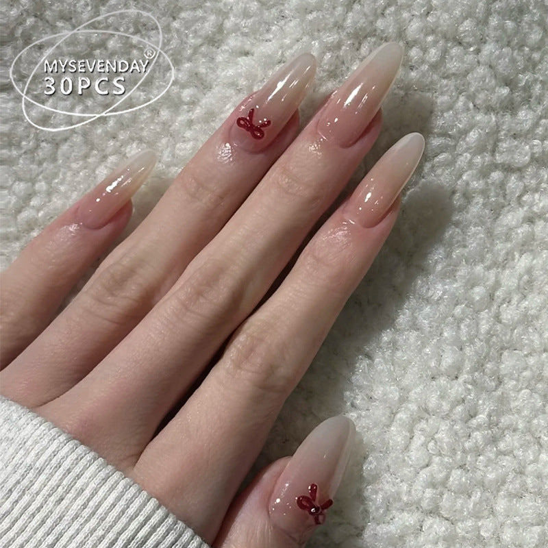 Elegante Stiletto Press-On Nägel mit dekorativen Schleifenakzenten Brehn