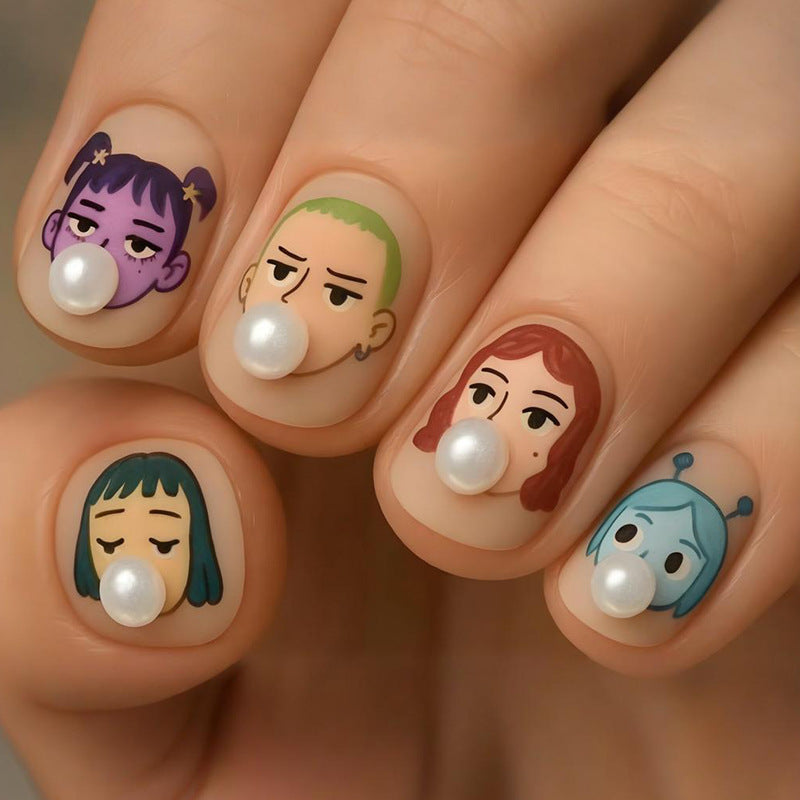 Kunstnagelset mit kreativen Charaktermotiven und eleganten Perlenakzenten Brehn