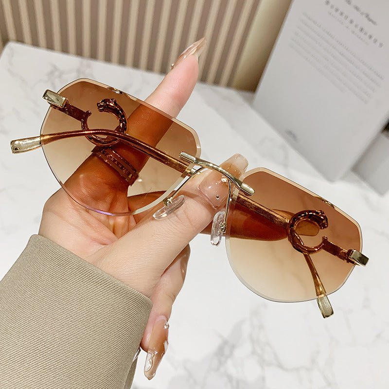 Damen trendige schicke Sonnenbrille im modernen Design mit filigranem Metallrahmen Brehn