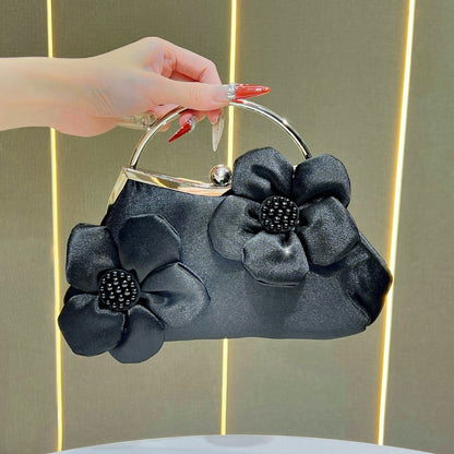 Florale Akzent Clutch