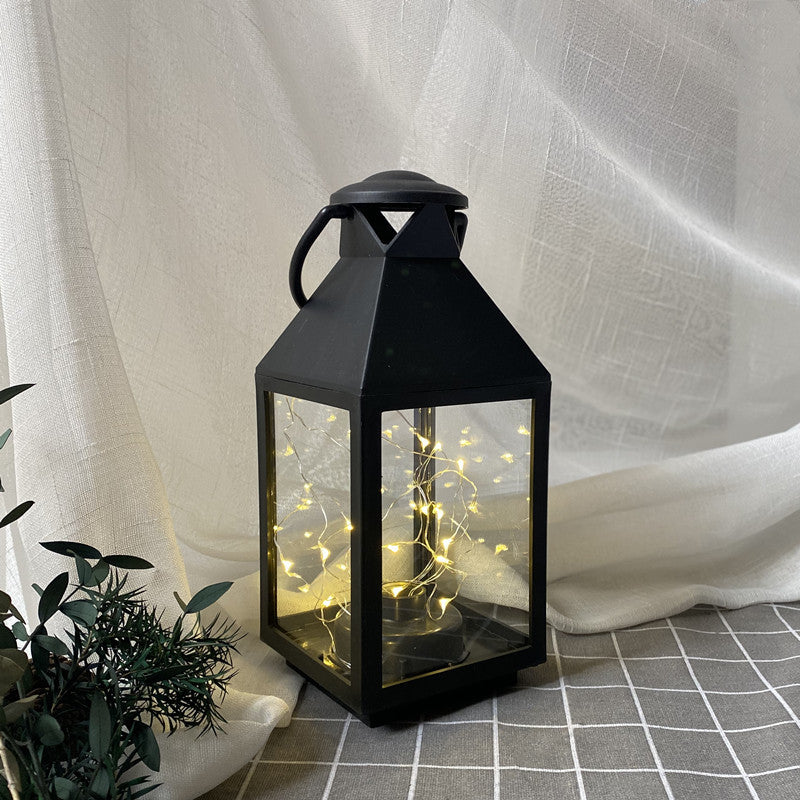 Dekorative Metall- und Glaslaterne mit warmen LED-Feenlichtern Brehn