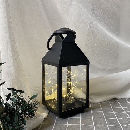Dekorative Metall- und Glaslaterne mit warmen LED-Feenlichtern Brehn