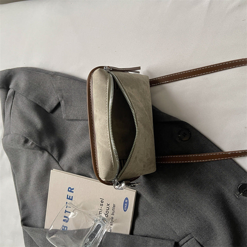 Kompakte Multipocket-Clutch Tasche