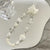 Herz und Schmetterling Charm Perlenarmband Brehn