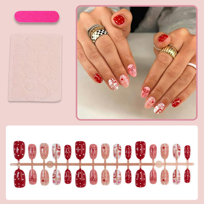 Kunstnagelset mit bezaubernden Herz- und Schleifenmustern Brehn