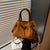 Elegante Wildleder Handtasche Brehn