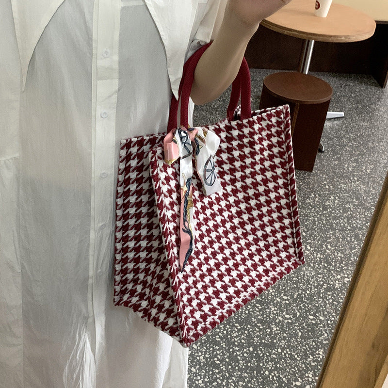 Elegante Houndstooth-Handtasche mit dekorativem Schleife