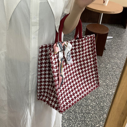 Elegante Houndstooth-Handtasche mit dekorativem Schleife