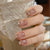 Elegantes Press-On Nagelset mit funkensprühendem Design Brehn