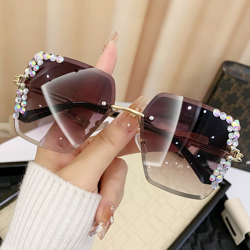 Damen Sonnenbrille mit extravagantem Strassrahmen Brehn