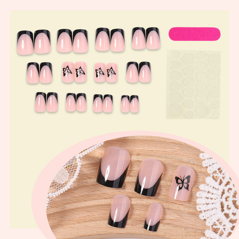 Dekoratives Press-On Nagelset mit eleganten Schleifenakzenten Brehn