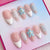 Künstlerisches florales und abstraktes Design Press-On Nagelset Brehn