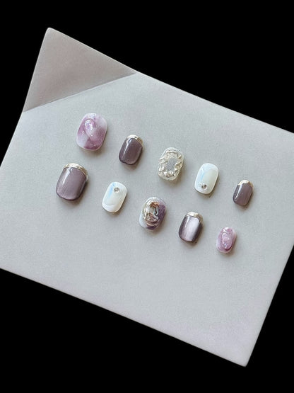 Künstlerisches Press-On Nagelkunst Set mit einzigartigen Ombre- und metallischen Akzenten