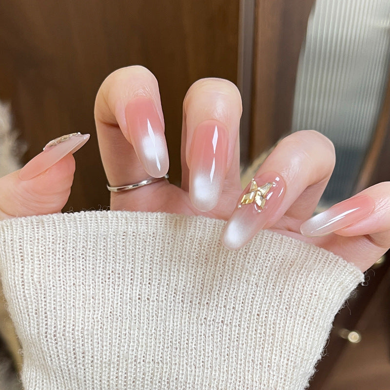 Elegante Ombre Press-On Nägel mit floralen Schmetterlingsakzenten Brehn
