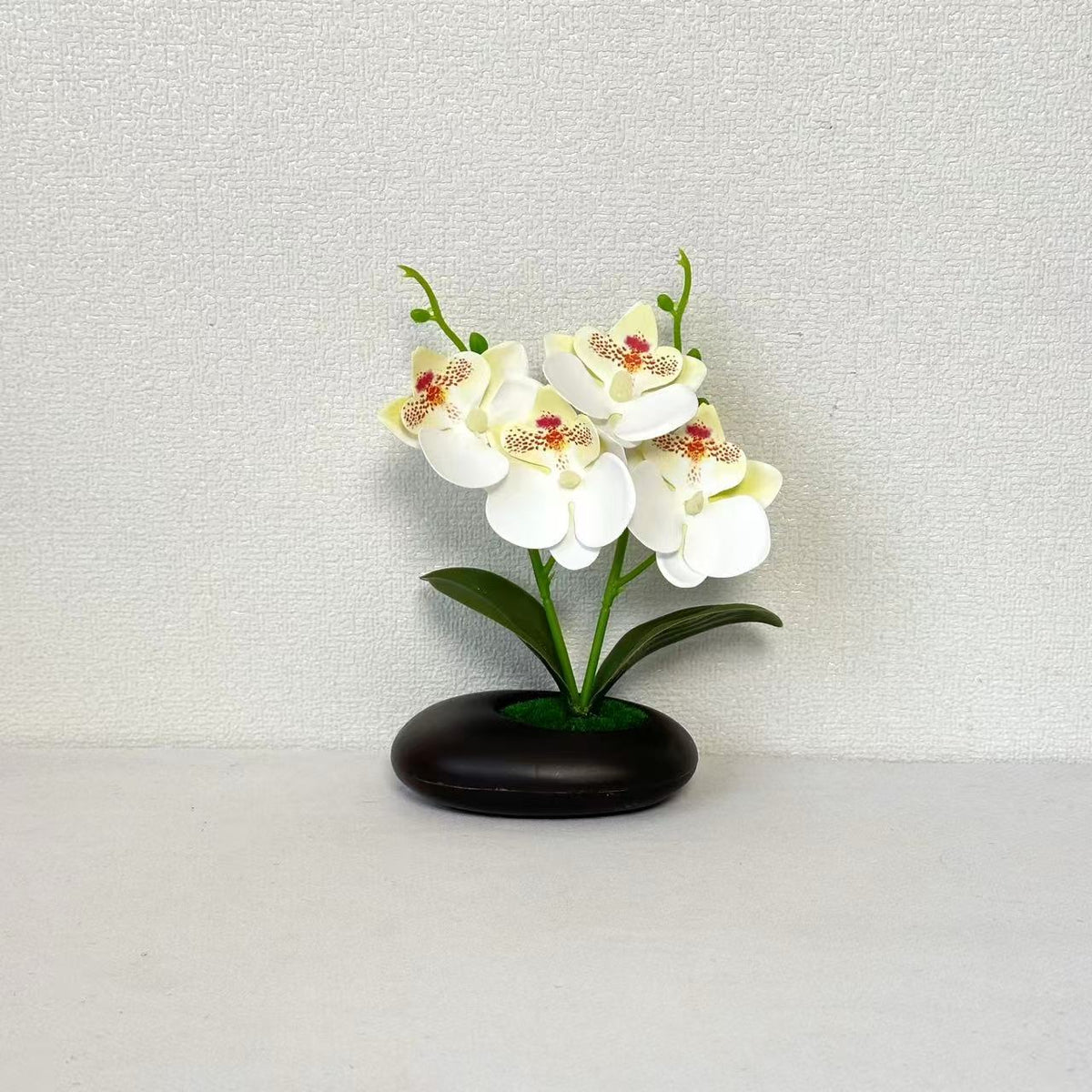 Elegante künstliche Orchideenblumenarrangements für die Innendekoration