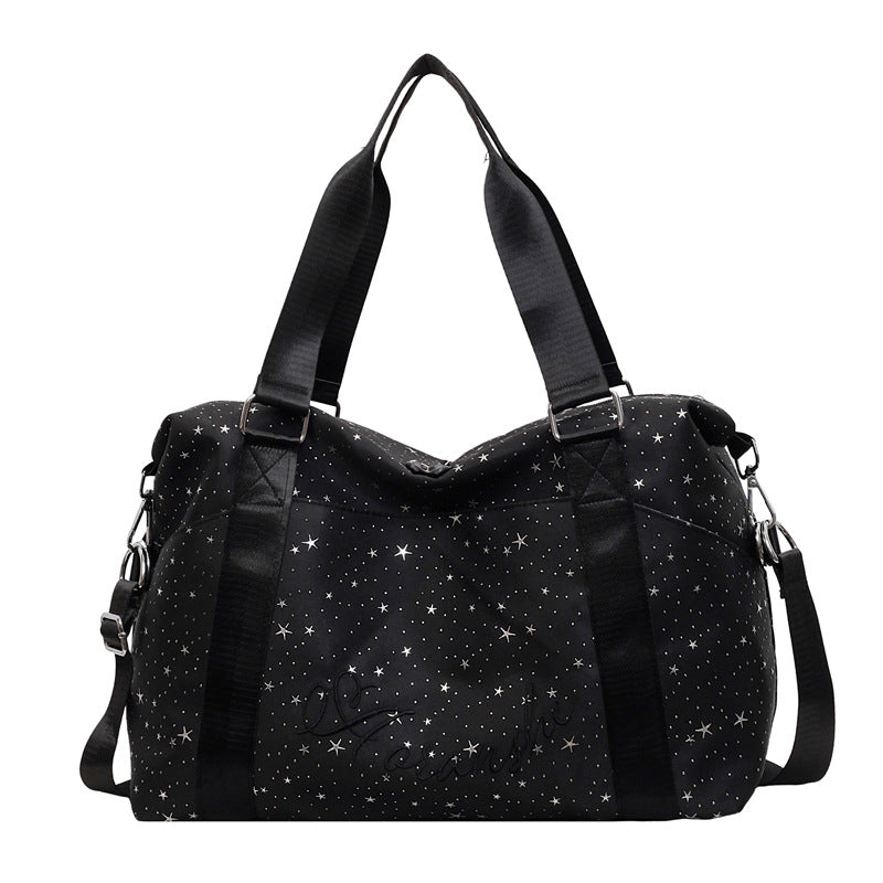 Stylische mit Sternen verzierte Reisetasche