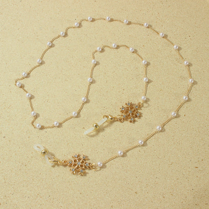 Elegante Brillenhalterkette mit Perlen und Schneeflockenanhänger Brehn