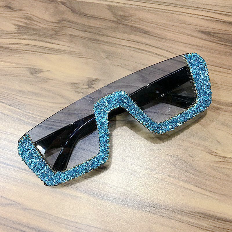 Damen elegante Glitzer-Sonnenbrille mit markantem Rahmen Brehn