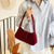 Elegante Samt-Handtasche mit Schleifendetail Brehn