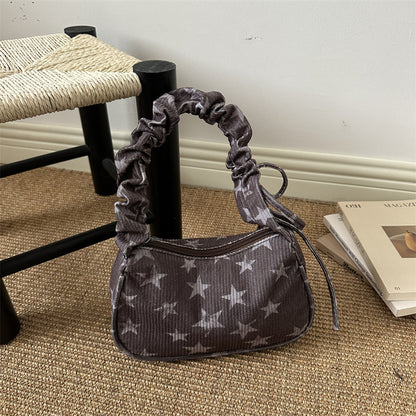 Stylishe Sternenprint-Handtasche