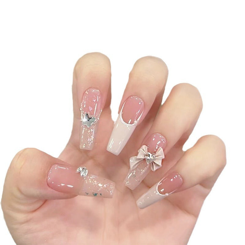 Kunstfingernägel mit Glitzerakzenten und Verspielten Motiven Brehn