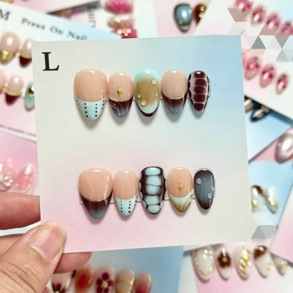 Dekoratives Handgefertigtes Press-On Nagelkunstset mit von Strand inspirierten Designs