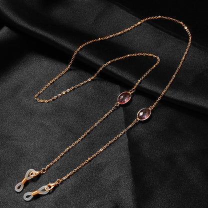 Eleganter mit Edelsteinen verzierter Brillenhalter Brehn