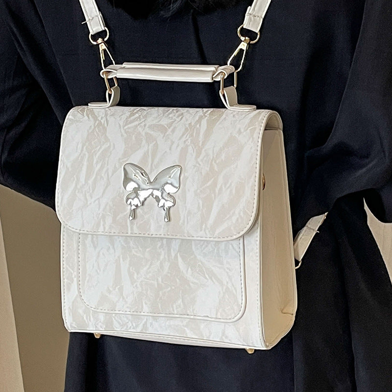Schmetterlingsverzierte Handtasche