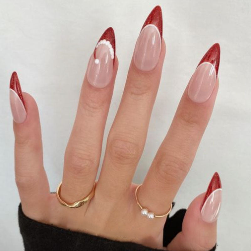 Künstlerische French Tip Press-On Nägel mit Glitzerakzenten Brehn