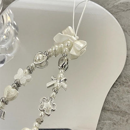 Herz und Schmetterling Charm Perlenarmband Brehn